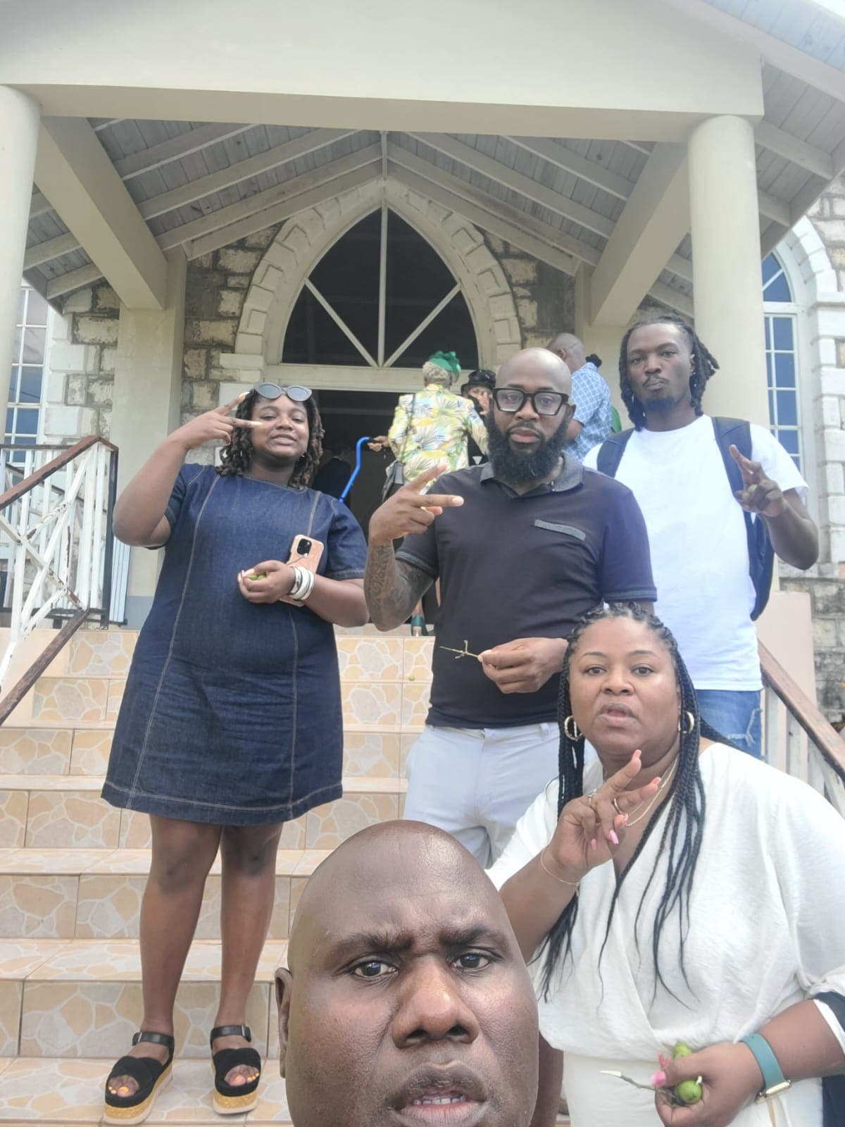 Members of the Foundation and Goodwill School Alumni Foundation team posing on the steps of the event venue
