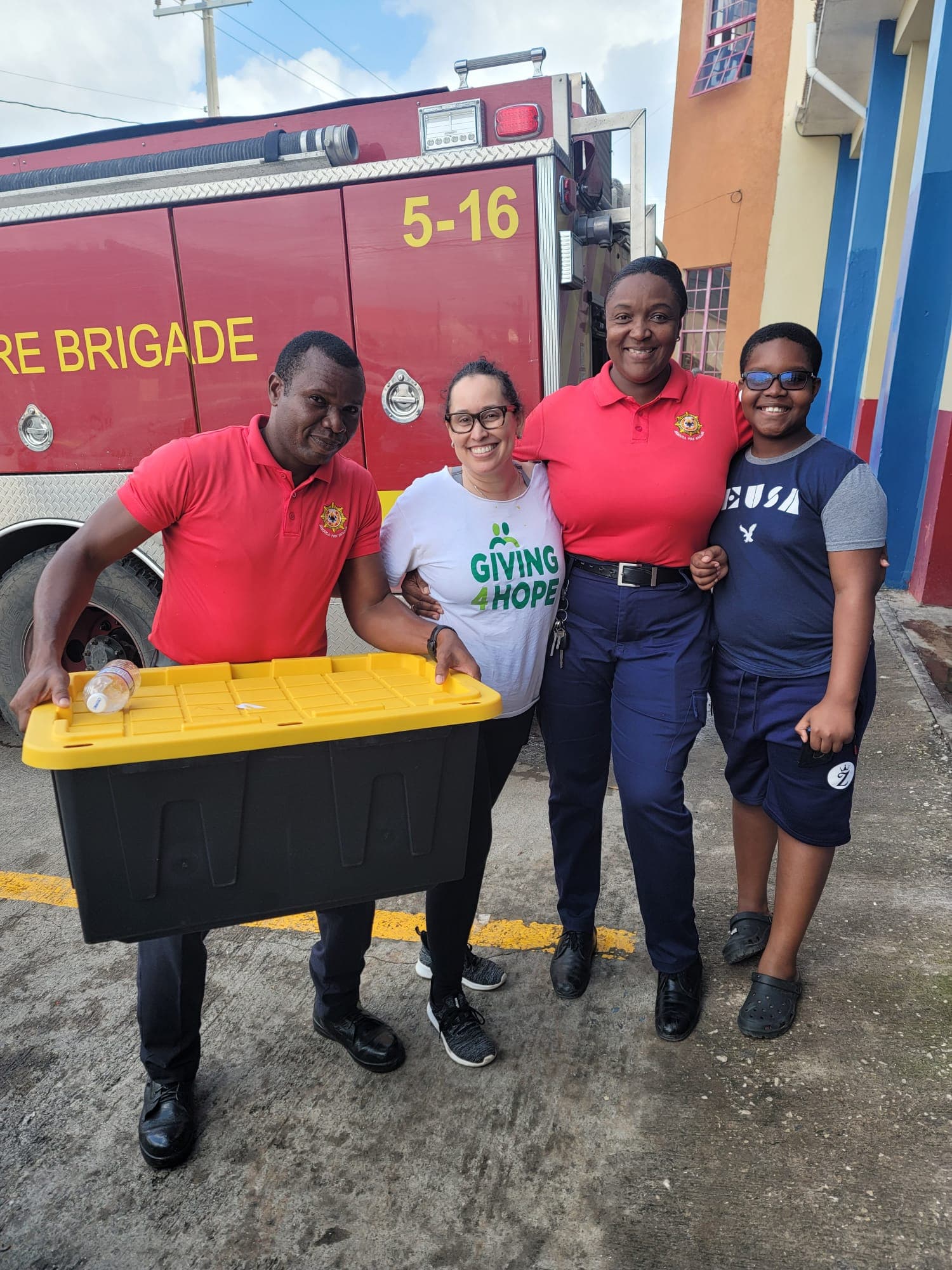 Foundation team coordinating with community members during relief distribution