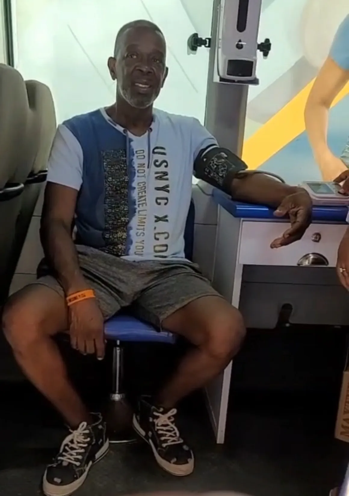 Community member receiving health screening